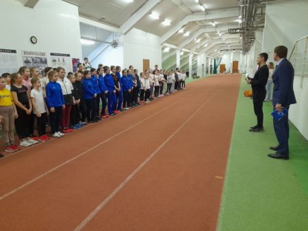 легкоатлеты